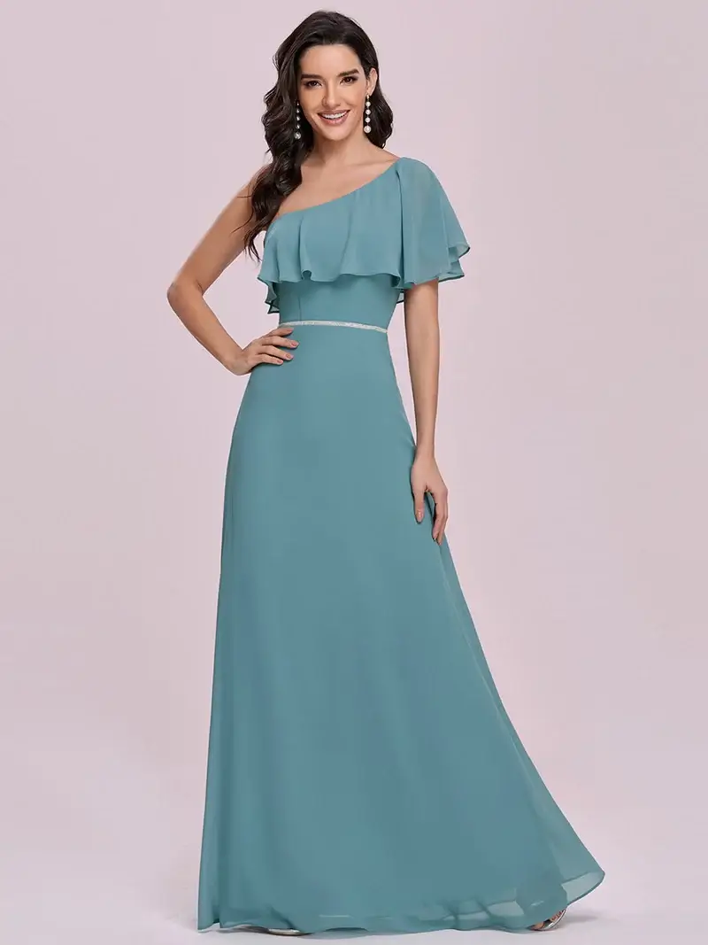 ey0124 dusty blue 2 one shoulder chiffon evening gown with diamante waist and ruffle sleeve eternally yours