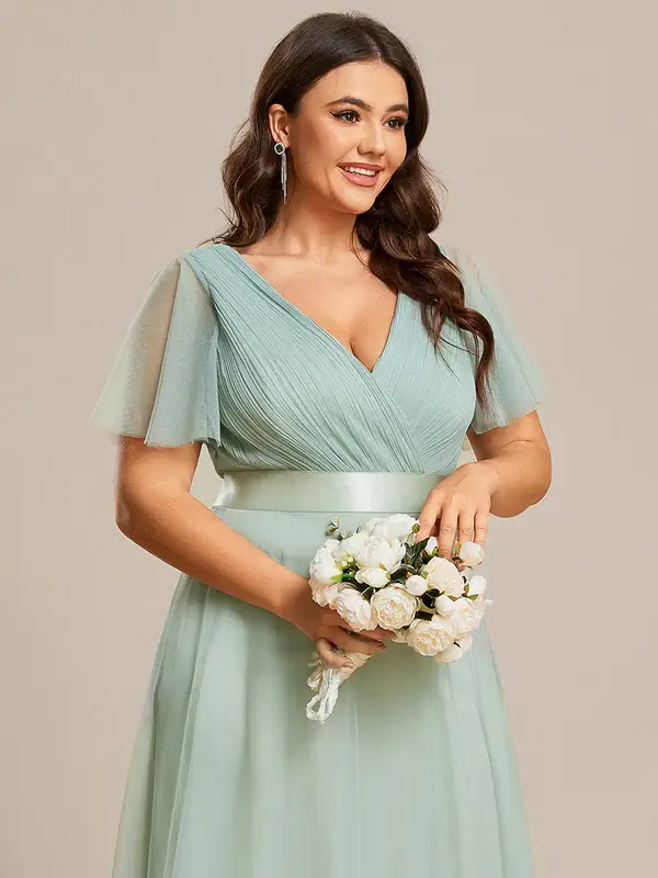 ey7962 mint green plus size a-line long evening gown with tulle and ruffle sleeves eternally yours