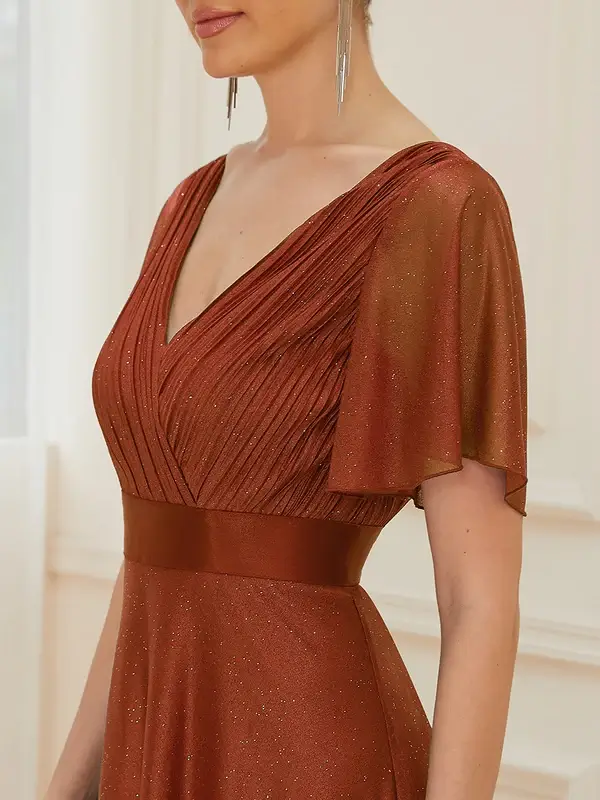 ey50159 burnt orange 2 glitter aline long evening gown with flutter sleeves eternally yours