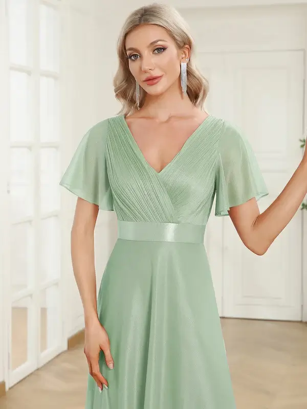 ey50159 mint green 2 glitter aline long evening gown with flutter sleeves eternally yours
